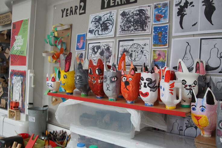 Animal plant pots made out of recycled milk cartons.