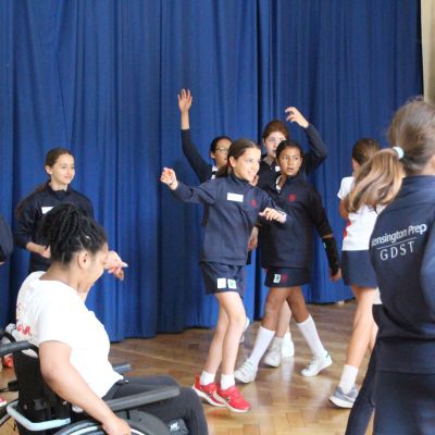 Year 6 girls taking part in dance workshop with icandance.
