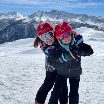 Ken Prep girls hugging on ski trip.