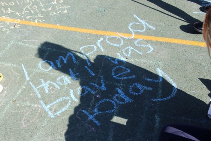 Writing on the playground that reads 'I am proud that I was brave today.'